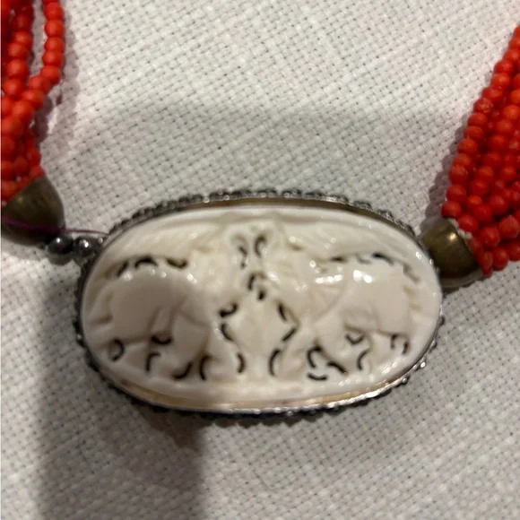 Handcrafted Red Multi-Strand Beaded Necklace with Oval Carved Elephant Pendant - Picture 4 of 5